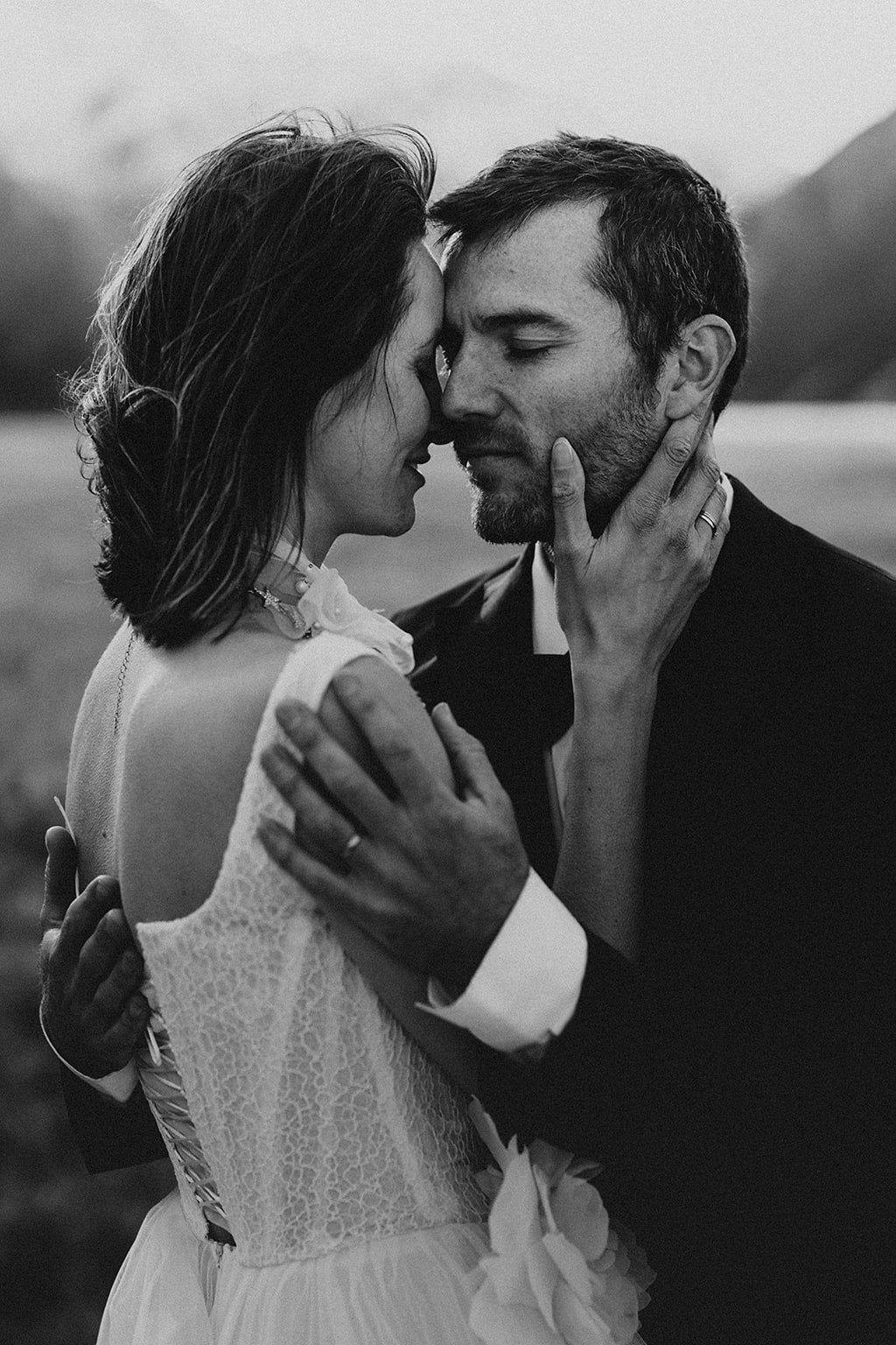Black and white portrait of a couple, back of a lace corset wedding dress with lace-up closure, Chrysanthemum