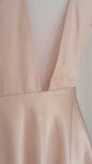 Detail of the deep V-neck blush satin lining under a short star lace wedding dress, dress form, Cosmic Dancer