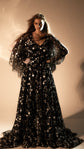 Full-length black celestial wedding dress with star lace skirt and train, hands on hips, Counting Stars Black