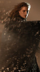 Black star lace sleeve sweeping in motion, glittering stars catching the light, Counting Stars Black wedding dress