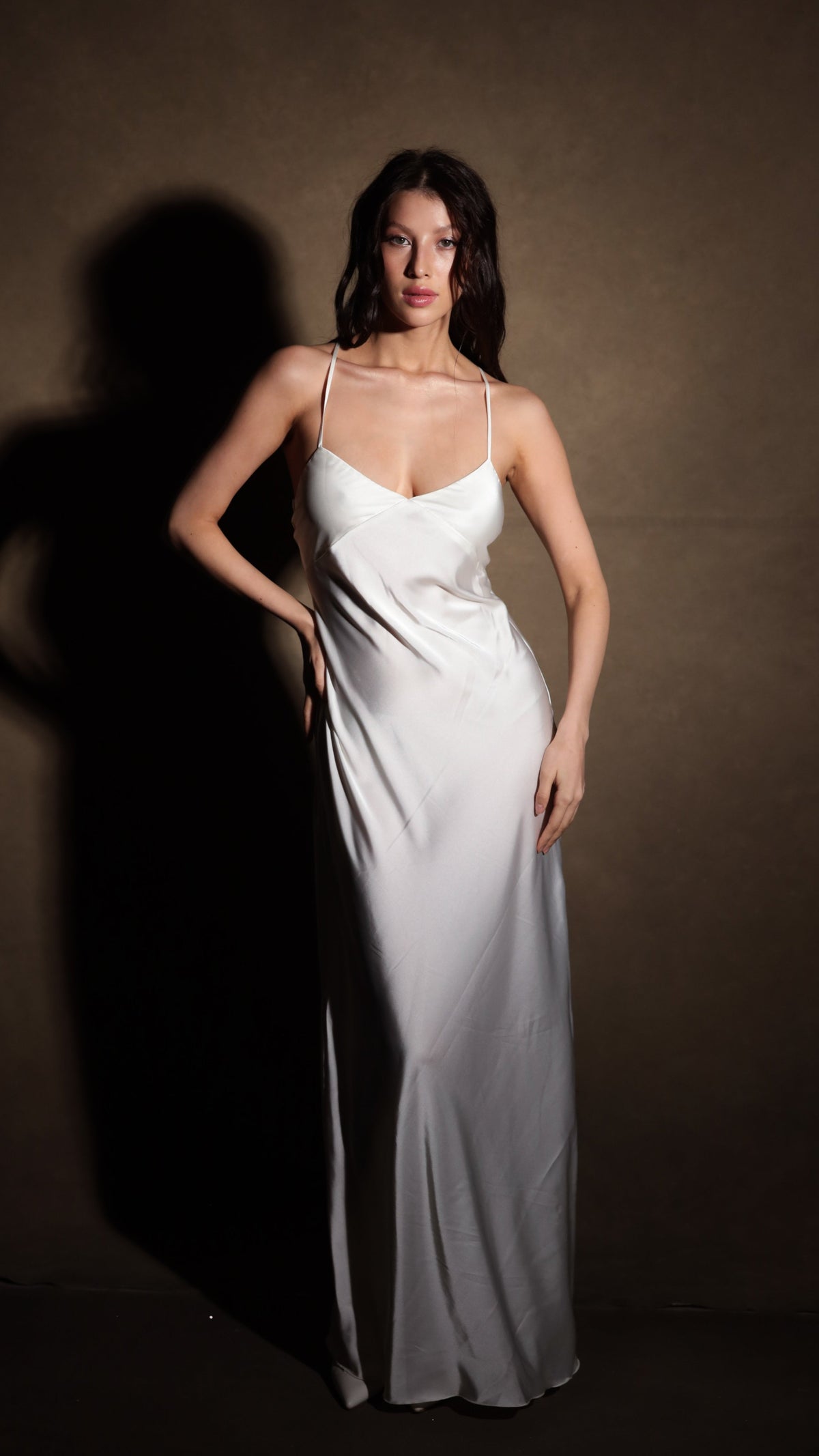 Ivory version of the long bridal slip dress with spaghetti straps and a V neckline, shown for colour comparison, Infinity Slip Black