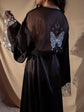 Celestial whimsigoth bridal robe in black, butterfly and crescent moon embroidered on the sheer back, star sleeve raised, Metamorphosis Robe Black