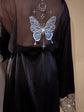 Close-up of a black bridal robe back, butterfly, moon and star embroidery on the sheer panel, Metamorphosis Robe Black