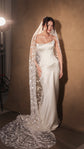 Celestial star wedding veil worn over the head with a satin corset gown, cathedral train pooled on the floor, Milky Way Veil by Ephemeris