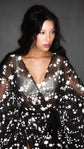 Close-up of a black star tulle bridal robe wrapped in a deep V with a ribbon tie, flash-lit stars, Orion Robe Black