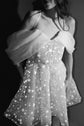 Black and white crop of an off-shoulder mini wedding dress with star lace skirt and fine straps, Shooting Star
