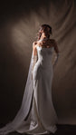Full-length satin bridal separates in a pool of studio light, scarf streaming to a satin train, gloves to the elbow, Solana Ensemble