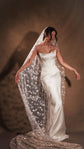 Satin bridal skirt worn under a long star tulle veil, bride with arms out on a studio backdrop, celestial, Solana Skirt