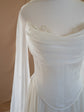 Detail of an ivory bridal corset with a draped chiffon neckline and star lace at the cups, sheer panel behind, Venus Corset